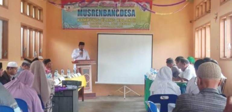 Reje Kampung Blang Kolak II Idha, S.Pd saat memberikan kata sambutan pada Musrembangdes TA. 2023